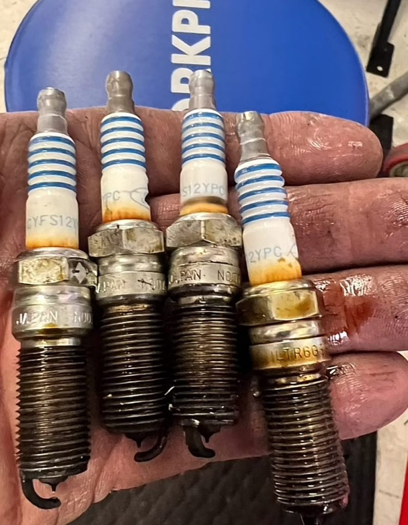 Understanding Causes And Solutions For Oil On Spark Plugs Threads